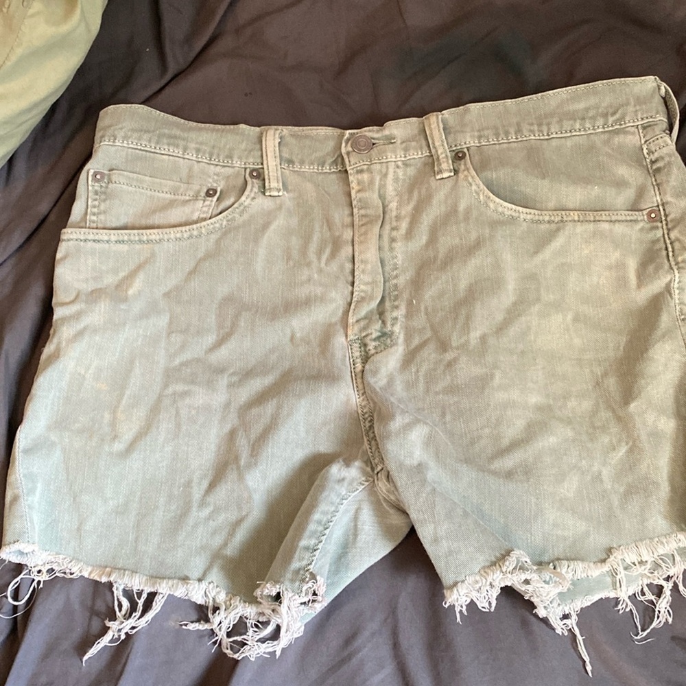 Very light mint green Levi shorts. Size 34.